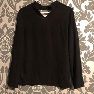 Black blouse with black choker collar